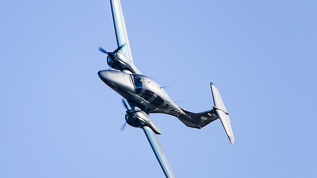 DA62  flying in blue sky. 