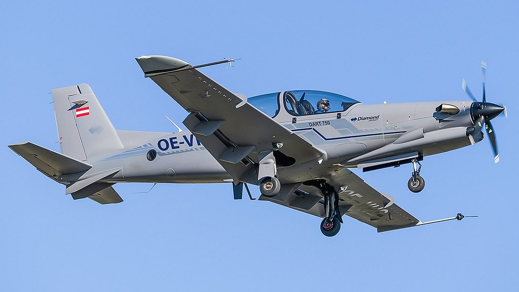 DART-750 flying in blue skies. 