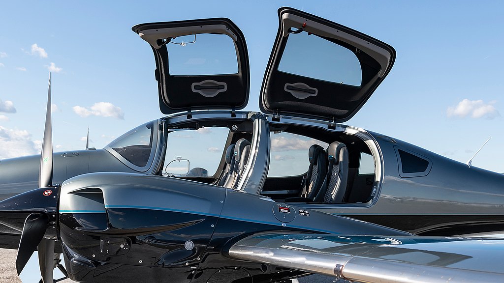 Sideview of a DA62 with open front and rear door